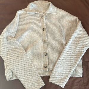 Soft button up sweater.